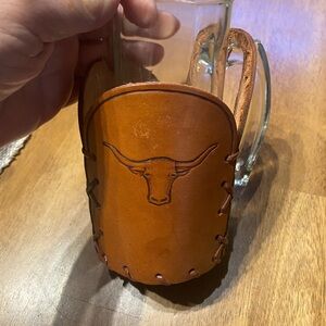 Longhorn glass beer mug with a removable leather wrap.